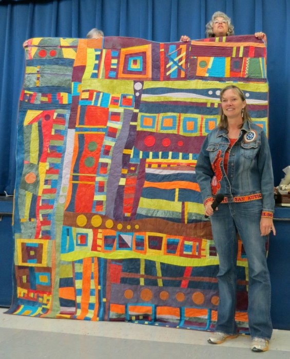 Donna with her Birthday Quilt, made by her Thimbleweed Friends