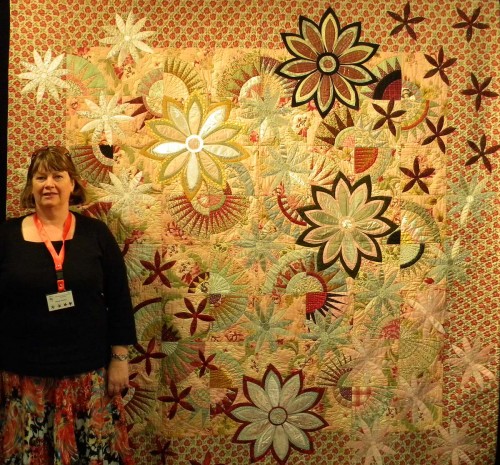 Sheryl Anicich and her quilt, "New York Garden"