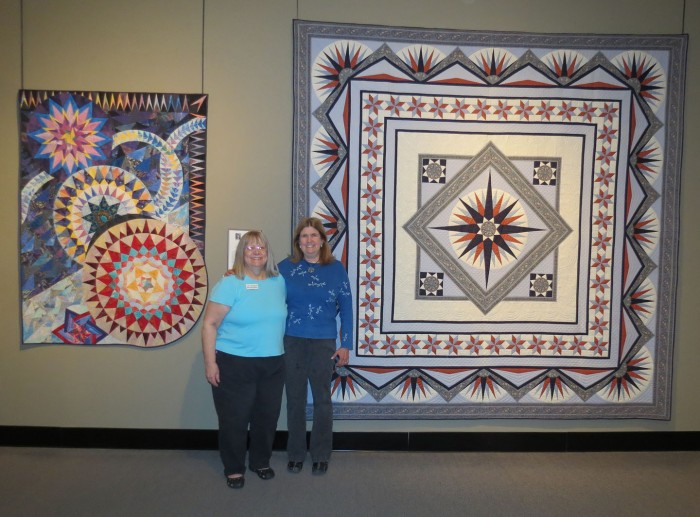Museum Curator, Judy Schwender and I with my quilts.
